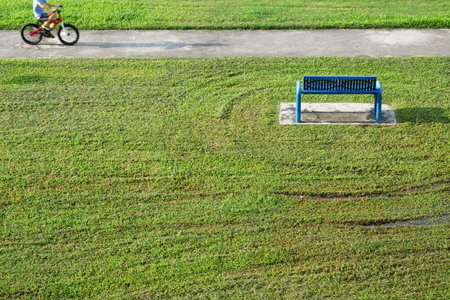 Kid cycling in a parkの写真素材