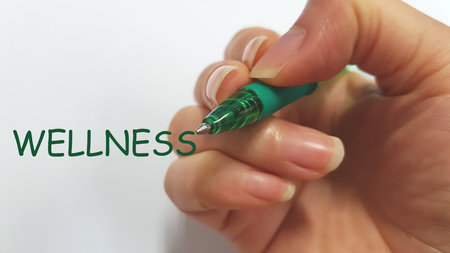 Hand writing wellness mindful mindfulness mindless conceptの写真素材