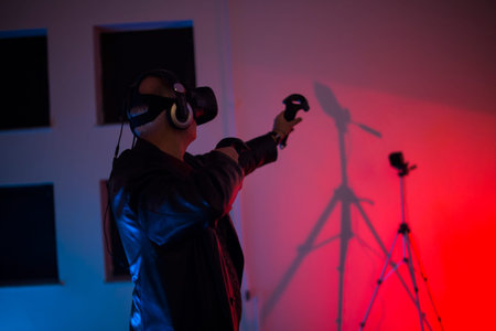 old man playing with oculus rift vr gaming