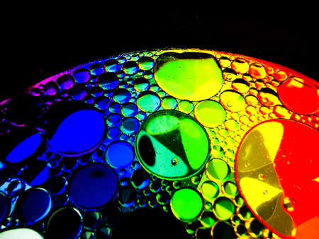 colorful rainbow spectrum oil bubbles macro abstract texturesの写真素材