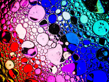 colorful rainbow spectrum oil bubbles macro abstract texturesの写真素材