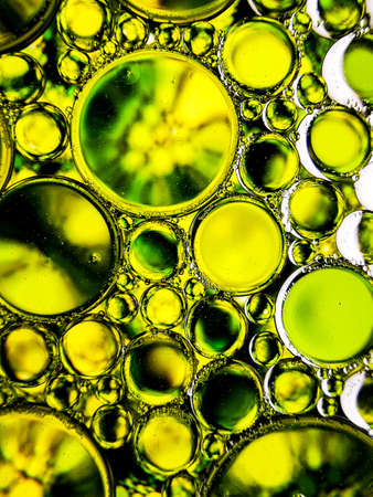 green abstract oil bubbles pattern textures macro for backgroundsの写真素材