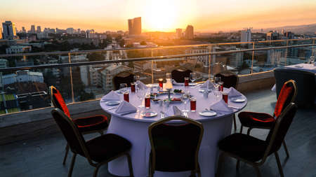 fancy sunset table on roof tea timeの写真素材