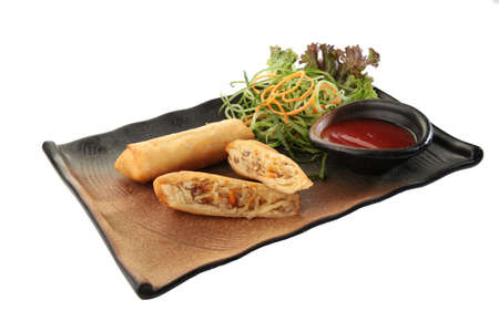 spring rolls asian cuisine and salad side dish isolated white backgroundの写真素材