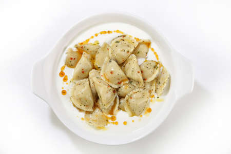 turkish traditional food named manti top view isolatedの写真素材