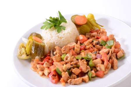 chicken saute with rice white backgroundの写真素材