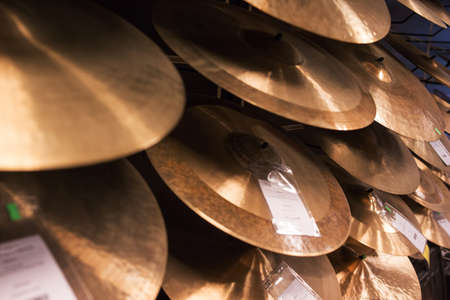 cymbals for drummers at music store ready to perform drum soloの写真素材