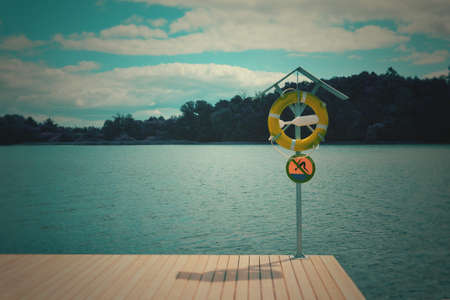 Sign over the lakeの写真素材