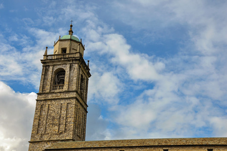 Close-up of church bell tower made of bricks in Bellagio, a charming tourist village between the lake and the mountains of the Alps. Located in the Lombardy region, northern Italyの写真素材