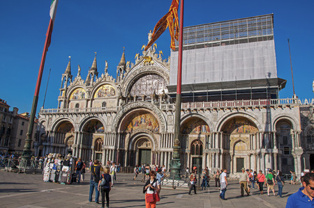 View of San Marco Basilica with marble sculptures and golden mosaics in Piazza San Marco. At the city center of Venice, the historic and amazing marine city. Veneto regionのeditorial素材