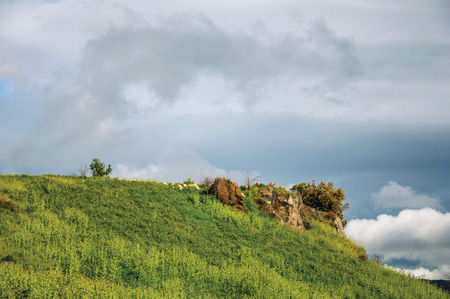 Overview of hill and fields on a cloudy day near the town of Frascati, a pleasant and well known place for its fine wines, near Rome. Located in the Lazio region, central Italyの写真素材