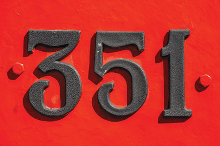 Detail of iron number in an old locomotive at Monte Alegre do Sul. In the countryside of S?o Paulo State, the region rich in agricultural and livestock products, southwestern Brazilの写真素材