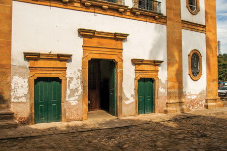 View of old colored church doors and cobblestone street in Paraty, an amazing and historic town...