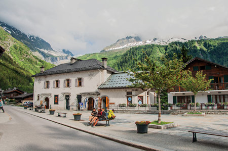 Argentière, France - June 26, 2016. Village center with houses and alpine landscape in Argentiere An adorable ski and hike resort located in Haute-Savoie Province, near Chamonix in the French Alpsのeditorial素材