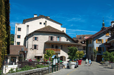 Talloires, France - June 29, 2016. View of street and houses in the village of Talloires, near the Lake of Annecy. Department of Haute-Savoie, Auvergne-Rhone-Alpes region, south-eastern France.のeditorial素材