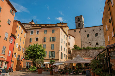 Grasse, France - July 12, 2016. View of buildings with restaurants in Grasse, the friendly town known for producing perfumes. In Alpes-Maritimes department, Provence region, southeastern Franceのeditorial素材