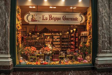 Brussels, Belgium - July 04, 2017. Shop window in the Galeries Royales Saint-Hubert at Brussels. Vibrant and friendly, is the country's capital and administrative center of the EU. Central Belgiumのeditorial素材