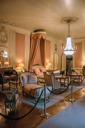 Furniture in luxurious De Haar Castle bedroom, near Utrecht. Of medieval origin, it underwent reforms until assuming a richly decorated Gothic style.のeditorial素材