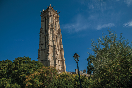 Flamboyant Gothic Saint-Jacques Tower and blue sky in the City Center of Paris. Known as the "City of Light", it is one of the most impressive cultural centers in the world. Northern France.のeditorial素材