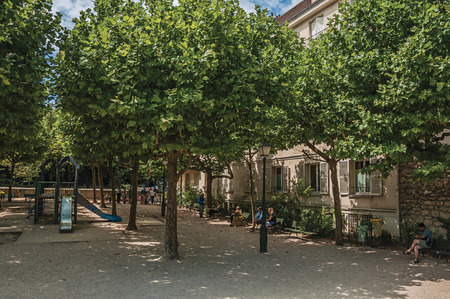 Paris, France - July 08, 2017. People having fun in condos gardens at Montmartre in Paris. Known as the "City of Light", it is one of the most impressive cultural centers in the world. Northern France.のeditorial素材