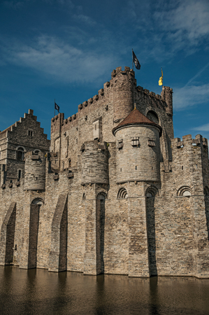 Close-up the stone wall and watch-tower of the Gravensteen Castle in Ghent. In addition to intense cultural life, the city is full of Gothic and Flemish style buildings. Northern Belgium.のeditorial素材