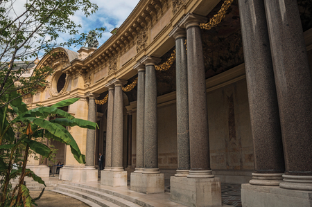 Close-up of the far-fetched decoration of arch and columns at the Petit Palais courtyard in Paris. Known as the "City of Light", it is one of the most impressive cultural centers in the world. Northern France.のeditorial素材