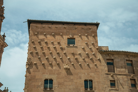 Casa de las Conchas building facade in gothic and plateresque style, adorned with more than 300 shells at Salamanca. This lovely medieval town is one of the most important university cities in Spain.の写真素材