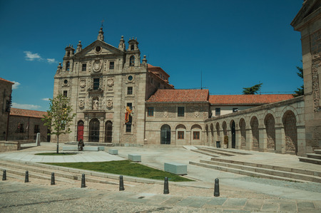Avila, Spain - July 23, 2018. Square in front the facade of Convent of Santa Teresa de Jesus at Avila. It has the longest and imposing wall completely encircling this well-kept gothic town of Spain.のeditorial素材