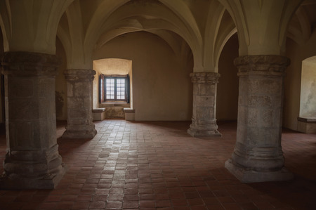Evoramonte, Portugal - July 6, 2018. Internal hall with thick columns and ceiling, at the Castle of Evoramonte. A tiny fortified civil parish over hill where stands out its historic castle in Portugalのeditorial素材