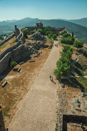 Marvao, Portugal - July 09, 2018. Pathway in the central courtyard encircled by thick stone wall at the Marvao Castle. An amazing medieval fortified village perched on a crag in eastern Portugal.のeditorial素材