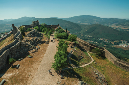 Marvao, Portugal - July 09, 2018. Pathway in the central courtyard encircled by thick stone wall at the Marvao Castle. An amazing medieval fortified village perched on a crag in eastern Portugal.のeditorial素材