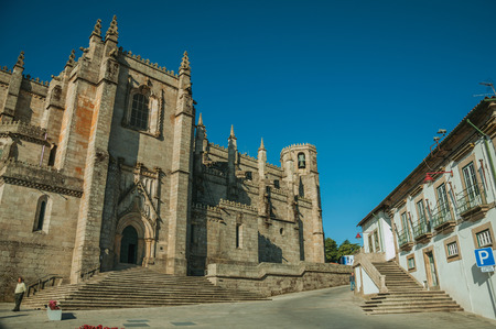 Guarda, Portugal - July 21, 2018. Gothic facade with staircase and door in front of square at the Guarda Cathedral. This friendly and well-kept medieval town is the highest in the continental Portugalのeditorial素材