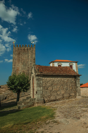 Chapels of Saint Anthony and Calvary with stone walls, in a sunny day at the medieval Belmonte Castle. A cute small town, birthplace of the navigator Pedro Alvares Cabral, on eastern Portugal.のeditorial素材