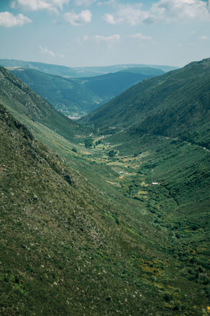Zezere River valley, a long green canyon formed by glacier thousands of years ago, in a sunny day at...