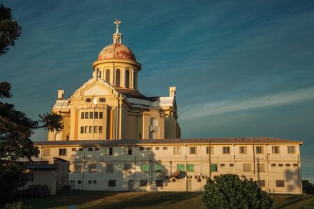 Cathedral and building at the Sanctuary of Our Lady of Caravaggio on sunset, in the countryside near Bento Goncalves. A friendly country town in southern Brazil famous for its wine production.の写真素材