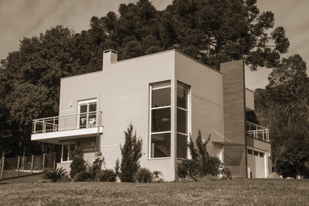 Charming modern country house with a lush garden and wooded landscape near Bento Goncalves. A friendly country town in southern Brazil famous for its wine production. Black and white photo.の写真素材