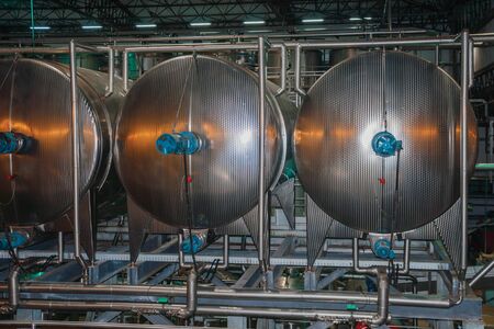 Bento Goncalves, Brazil - July 10, 2019. Steel storage tanks and equipment for wine production at Salton Winery plant near Bento Goncalves. A friendly country town famous for its wine production.のeditorial素材