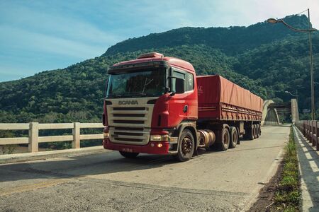 Bento Goncalves, Brazil - July 10, 2019. Truck passing by the Ernesto Dornelles concrete bridge near Bento Goncalves. A friendly country town in southern Brazil famous for its wine production.のeditorial素材