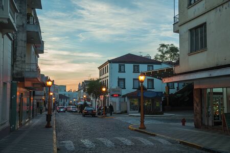 Garibaldi, Brazil - July 10, 2019. Shopping street at dusk with light pole lit in the old city center of Garibaldi. A small and graceful city founded by Italian immigrants in southern Brazil.のeditorial素材