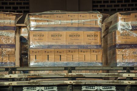 Bento Goncalves, Brazil - July 11, 2019. Truck trailer loaded with grape juice cardboard boxes from Aurora winery in Bento Goncalves. A friendly country town famous for its wine production.のeditorial素材