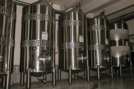 Bento Goncalves, Brazil - July 11, 2019. Stainless steel storage tanks for wine production at Aurora...