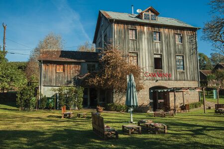 Bento Goncalves, Brazil - July 11, 2019. Charming old rural house made of wood and stone from the restaurant Casa Vanni near Bento Goncalves. A friendly country town famous for its wine production.のeditorial素材