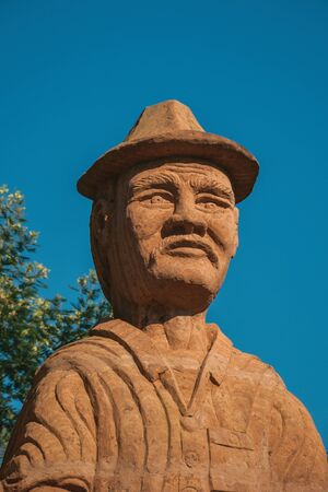 Nova Petropolis, Brazil - July 20, 2019. Sculpture detail of a immigrant at Sculpture Park Stones of Silence near Nova Petropolis. A lovely rural town founded by German immigrants.のeditorial素材