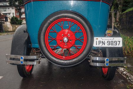 Gramado, Brazil - July 23, 2019. Detail of spare tire in the back of antique Ford 1929 car in...