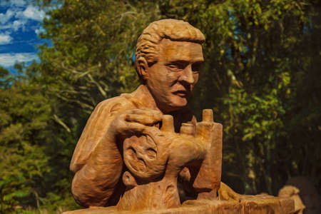 Sandstone sculpture of tailor with sewing machine at the Sculpture Park Stones of Silence near Nova Petropolis. A lovely rural town founded by German immigrants in southern Brazil. Oil Paint filter.のeditorial素材