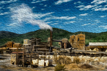 Old industrial plant with chimney in the middle of forest on the Way of St. James. A famous...