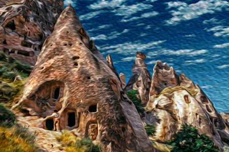 Curious geological landscape of rocky crags eroded by weather in Cappadocia. Located in the Turkish countryside, is a region famous for its unique historical and cultural heritage. Oil paint filter.の写真素材