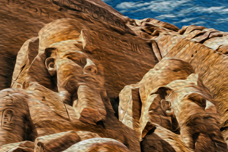 Colossal statues of pharaoh Ramses II carved into rock by the ancient Egyptians in the Abu Simbel...