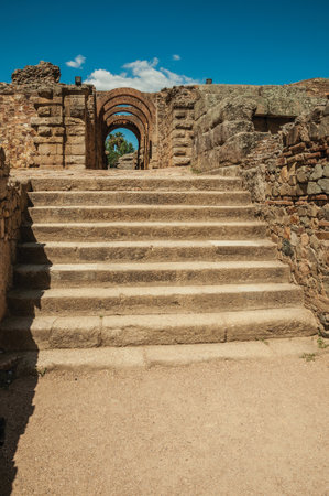 Exit gateway with arches of Roman Amphitheater and stairs at the archaeological site of Merida. A town founded by ancient Rome in Spain.の写真素材