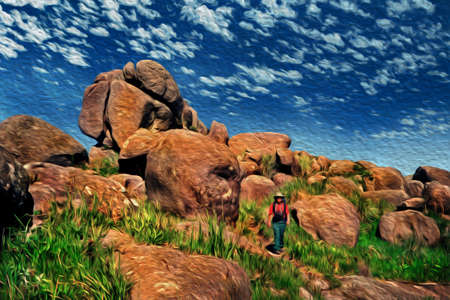People hiking on rocky terrain at the Marins Peak, one of the highest points at the Mantiqueira Ridge, in the Brazilian countryside. Oil Paint filter.の写真素材